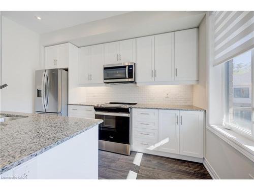 116-10 Birmingham Drive, Cambridge, ON - Indoor Photo Showing Kitchen With Stainless Steel Kitchen With Upgraded Kitchen
