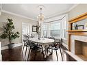 99 Burris Street, Hamilton, ON  - Indoor Photo Showing Dining Room With Fireplace 