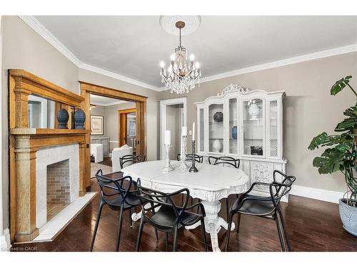 99 Burris Street, Hamilton, ON - Indoor Photo Showing Dining Room With Fireplace
