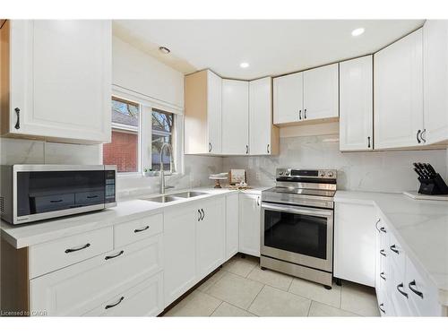 352 East 28Th Street, Hamilton, ON - Indoor Photo Showing Kitchen With Double Sink