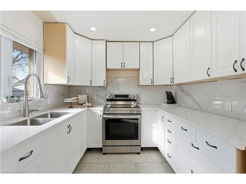 352 East 28Th Street, Hamilton, ON - Indoor Photo Showing Kitchen With Double Sink