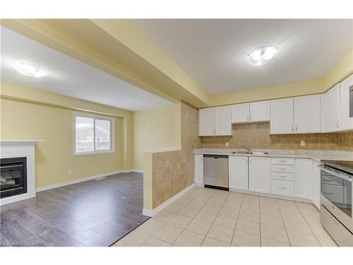 40 Red Clover Crescent, Kitchener, ON - Indoor Photo Showing Kitchen With Fireplace With Double Sink