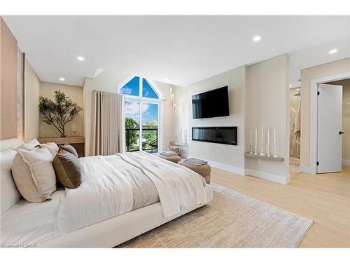452 Westhaven Street, Waterloo, ON - Indoor Photo Showing Bedroom With Fireplace