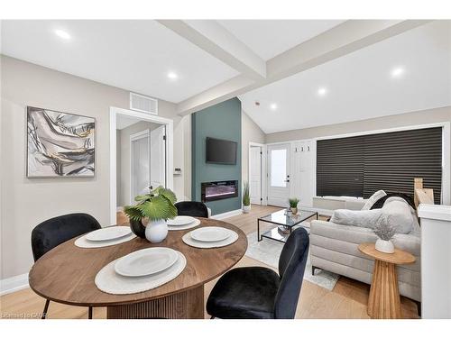 156 Walter Avenue N, Hamilton, ON - Indoor Photo Showing Dining Room With Fireplace