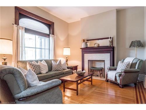 219 Charlton Avenue W, Hamilton, ON - Indoor Photo Showing Living Room With Fireplace