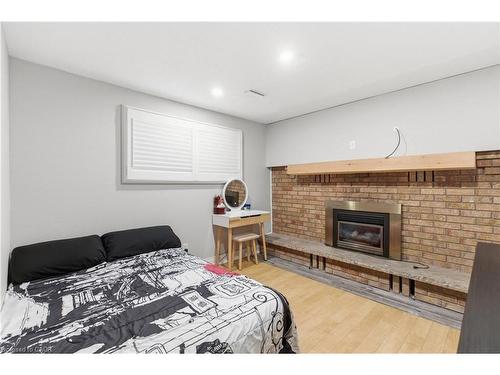 71 Allanbrook Street, Stoney Creek, ON - Indoor Photo Showing Bedroom With Fireplace