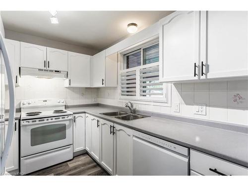20-1030 Colborne Street E, Brantford, ON - Indoor Photo Showing Kitchen With Double Sink