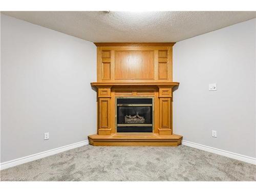 20-1030 Colborne Street E, Brantford, ON - Indoor Photo Showing Other Room With Fireplace
