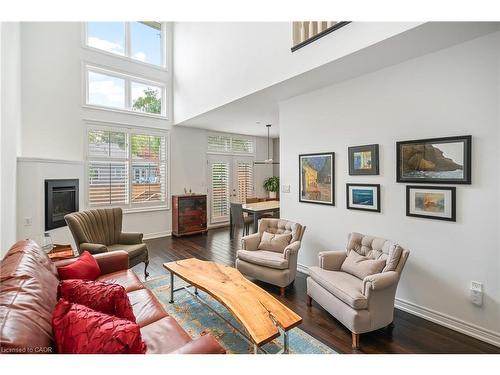 33-88 Lakeport Road, St. Catharines, ON - Indoor Photo Showing Living Room With Fireplace