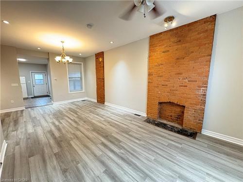 126 Park Street N, Hamilton, ON - Indoor Photo Showing Other Room With Fireplace