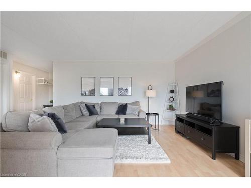 304-4450 Fairview Street, Burlington, ON - Indoor Photo Showing Living Room
