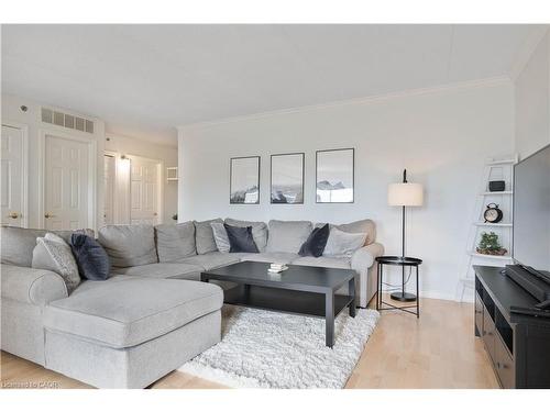304-4450 Fairview Street, Burlington, ON - Indoor Photo Showing Living Room
