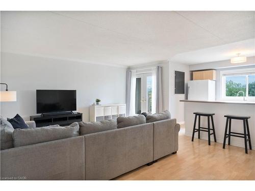 304-4450 Fairview Street, Burlington, ON - Indoor Photo Showing Living Room