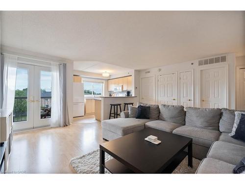 304-4450 Fairview Street, Burlington, ON - Indoor Photo Showing Living Room