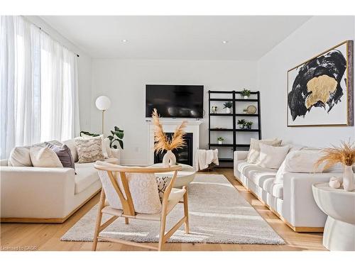 66 Cesar Place, Ancaster, ON - Indoor Photo Showing Living Room With Fireplace