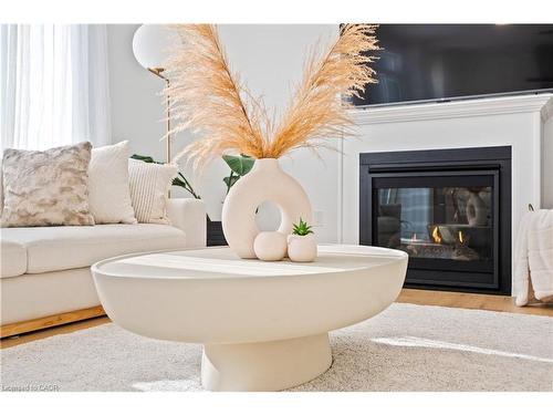66 Cesar Place, Ancaster, ON - Indoor Photo Showing Living Room With Fireplace