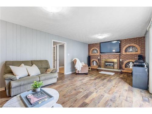 63 Lionsgate Avenue, Hamilton, ON - Indoor Photo Showing Living Room With Fireplace