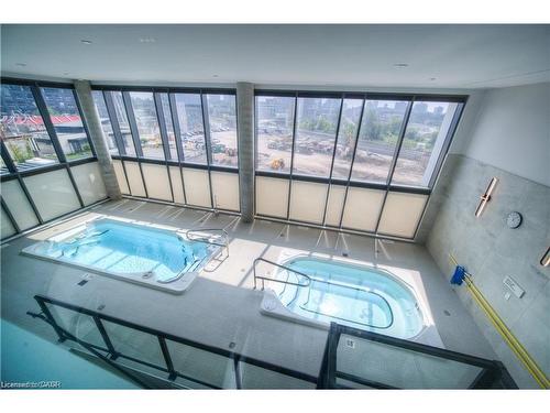 1114-15 Wellington Street S, Kitchener, ON - Indoor Photo Showing Other Room With In Ground Pool