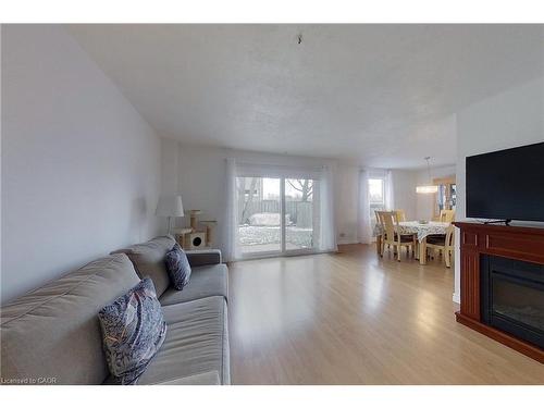 2-17 Gibson Drive, Kitchener, ON - Indoor Photo Showing Living Room With Fireplace