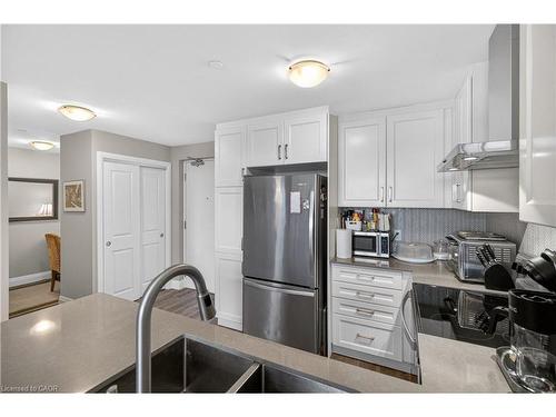 225-1 Redfern Avenue, Hamilton, ON - Indoor Photo Showing Kitchen With Stainless Steel Kitchen With Double Sink