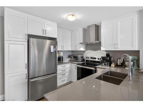 225-1 Redfern Avenue, Hamilton, ON - Indoor Photo Showing Kitchen With Stainless Steel Kitchen With Double Sink With Upgraded Kitchen