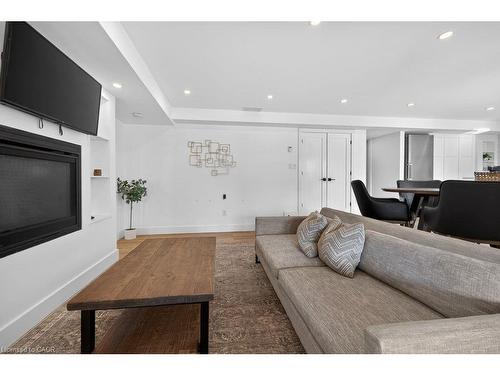 Lower Lvl-1326 Butter Road W, Hamilton, ON - Indoor Photo Showing Living Room With Fireplace