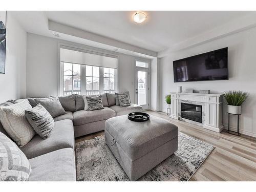 1841 Thames Circle, Milton, ON - Indoor Photo Showing Living Room With Fireplace