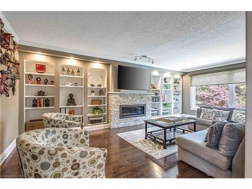 1399 Winterberry Drive, Burlington, ON - Indoor Photo Showing Living Room With Fireplace