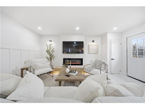 11 Garside Avenue S, Hamilton, ON - Indoor Photo Showing Living Room With Fireplace