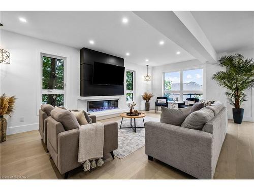 1207 Queen Street N, New Dundee, ON - Indoor Photo Showing Living Room With Fireplace