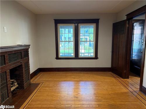 203 Fairleigh Avenue S, Hamilton, ON - Indoor Photo Showing Other Room With Fireplace