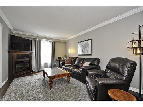 35 Haddaway Court, Cambridge, ON - Indoor Photo Showing Living Room With Fireplace