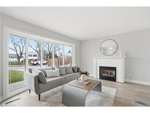 38 Coral Drive, Hamilton, ON - Indoor Photo Showing Living Room With Fireplace