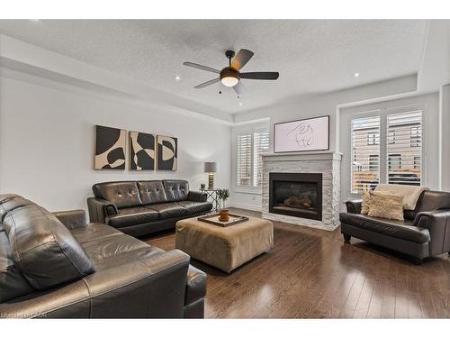 39 Deer Creek Street, Kitchener, ON - Indoor Photo Showing Living Room With Fireplace