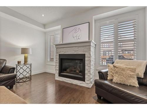 39 Deer Creek Street, Kitchener, ON - Indoor Photo Showing Living Room With Fireplace