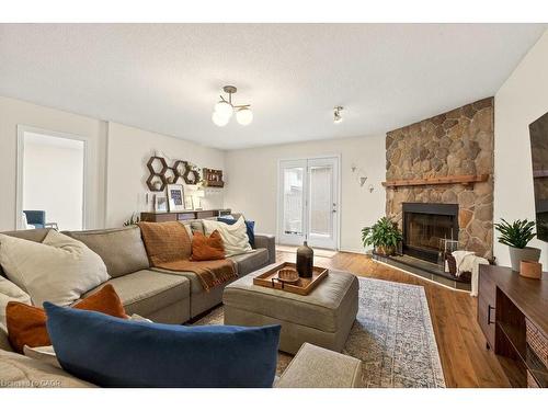 134 Sirente Drive, Hamilton, ON - Indoor Photo Showing Living Room With Fireplace