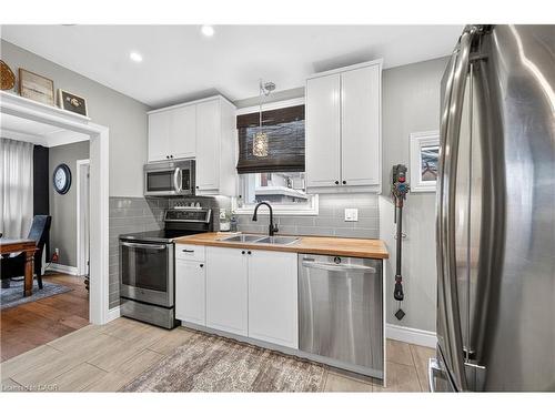 100 Ferndale Avenue, Hamilton, ON - Indoor Photo Showing Kitchen With Double Sink