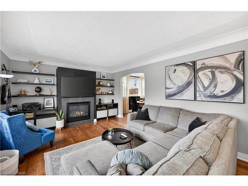 100 Ferndale Avenue, Hamilton, ON - Indoor Photo Showing Living Room With Fireplace