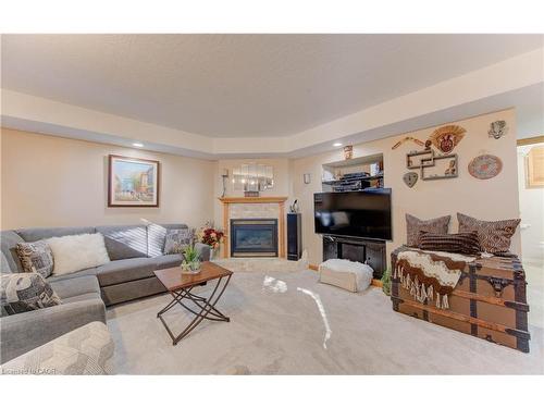 55 Gracefield Crescent, Kitchener, ON - Indoor Photo Showing Living Room With Fireplace