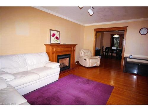 88 Cline Avenue N, Hamilton, ON - Indoor Photo Showing Living Room With Fireplace