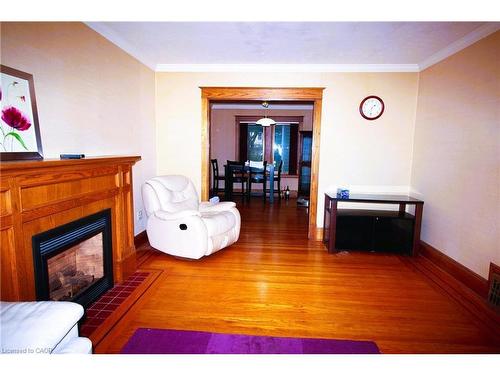 88 Cline Avenue N, Hamilton, ON - Indoor Photo Showing Living Room With Fireplace