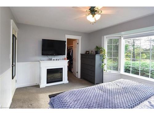 1284 Highway 54, Caledonia, ON - Indoor Photo Showing Bedroom With Fireplace