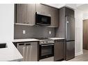 2304-25 Wellington Street S, Kitchener, ON  - Indoor Photo Showing Kitchen With Upgraded Kitchen 