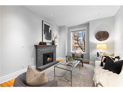 207 Stanley Avenue, Hamilton, ON - Indoor Photo Showing Living Room With Fireplace
