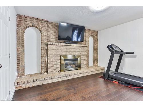 1267 Limeridge Road E, Hamilton, ON - Indoor Photo Showing Gym Room With Fireplace