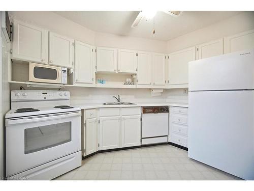 A21-296 Mill Road, Toronto, ON - Indoor Photo Showing Kitchen With Double Sink