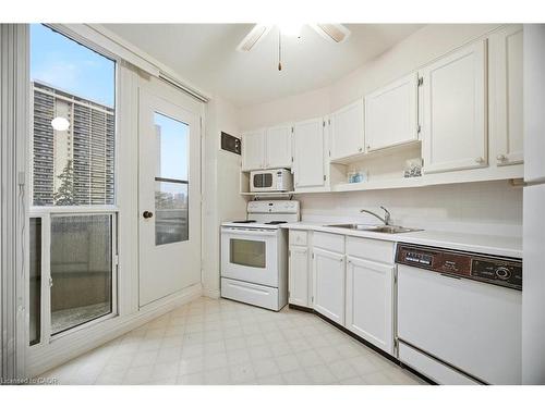 A21-296 Mill Road, Toronto, ON - Indoor Photo Showing Kitchen With Double Sink