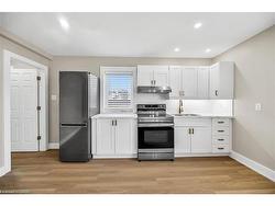 Upper 1-1466 Main Street E Hamilton, ON L8K 1C6