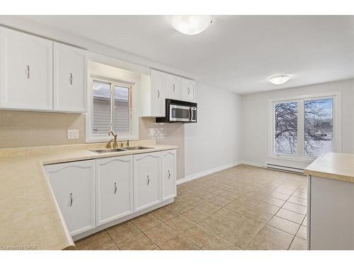 67 Old Carriage Drive, Kitchener, ON - Indoor Photo Showing Kitchen With Double Sink