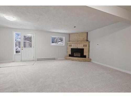 67 Old Carriage Drive, Kitchener, ON - Indoor With Fireplace